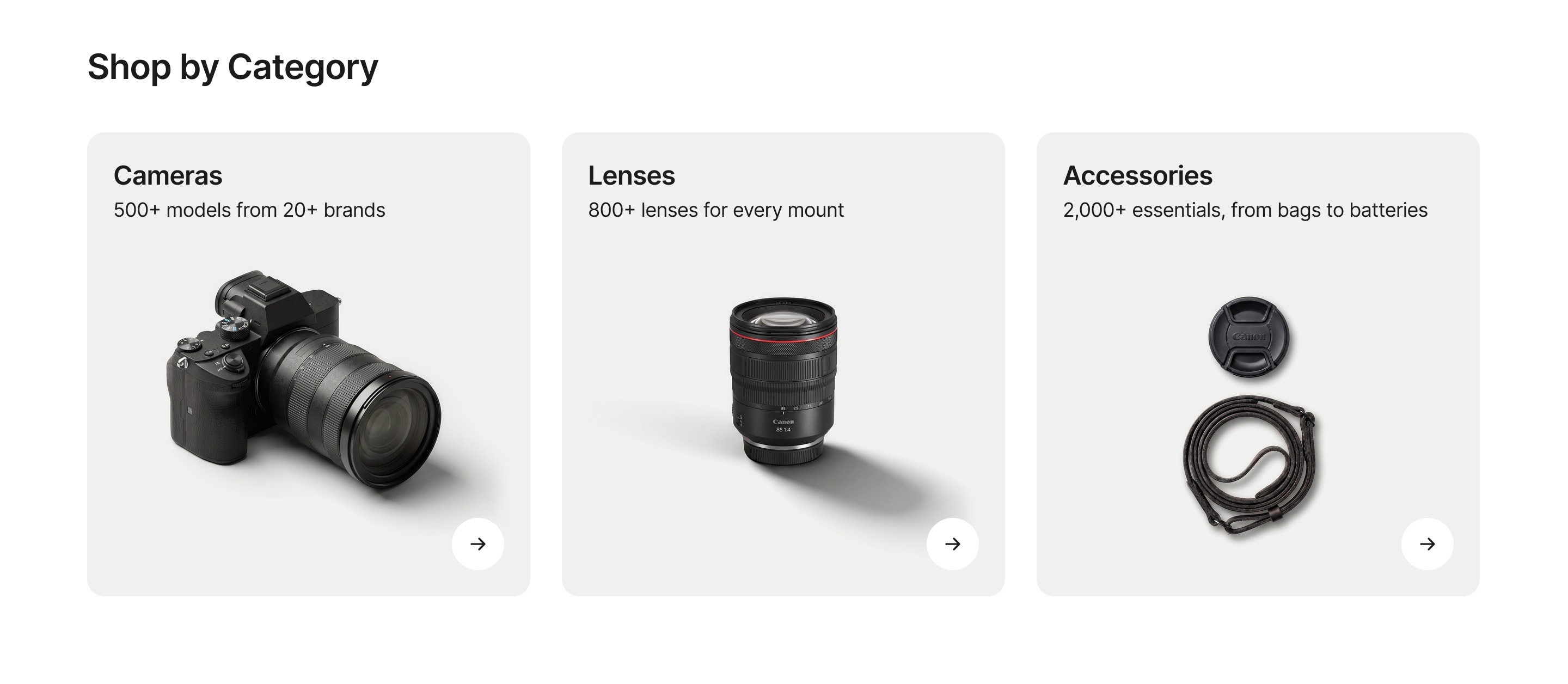 Three category tiles for Cameras, Lenses and Accessories, each with a product count